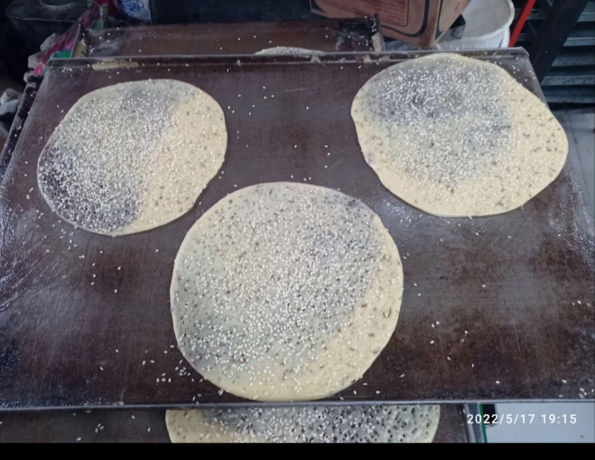 عکس کلوچه پزی سنتی جنوب