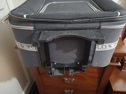 عکس تعمیرات چمدان، کیف و کفش محمودی