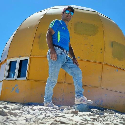 عکس جان‌پناه قله توچال