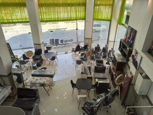 عکس فروشگاه لوازم اداری و آرایشگاهی تک