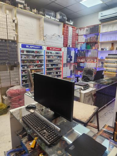 عکس فروشگاه دخانیات فاخر