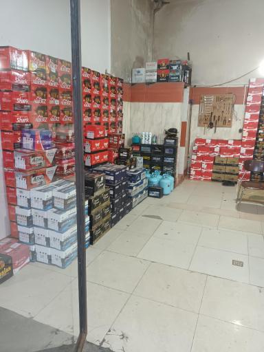 عکس باطری فروشی و شارژ گاز کولر فلاحی