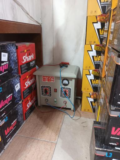 عکس باطری فروشی و شارژ گاز کولر فلاحی