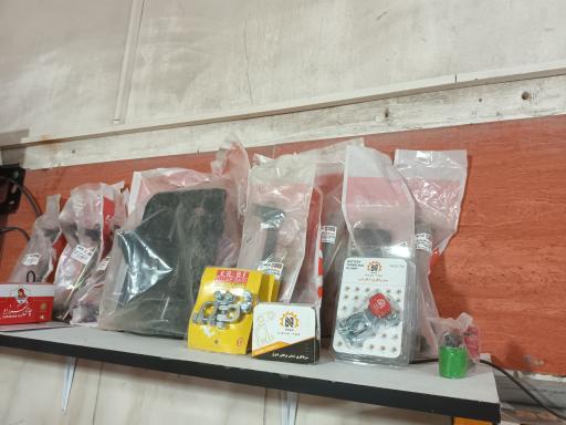 عکس باطری فروشی و شارژ گاز کولر فلاحی