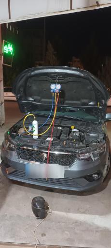 عکس باطری فروشی و شارژ گاز کولر فلاحی