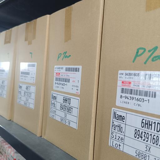 عکس فروشگاه لوازم یدکی ایسوزو (میلادی)