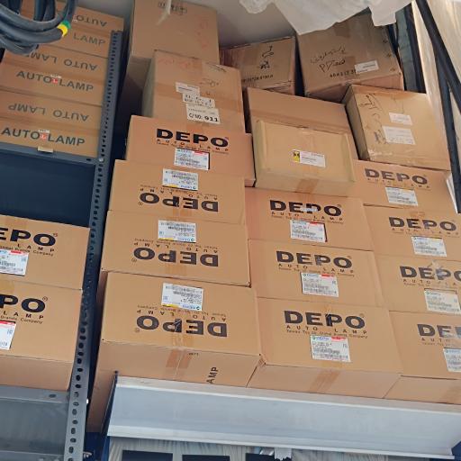 عکس فروشگاه لوازم یدکی ایسوزو (میلادی)