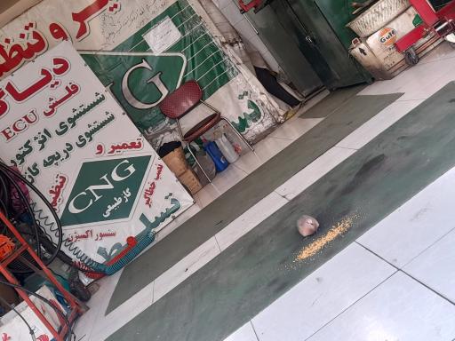 عکس تعمیر و تنظیم سی ان جی تسلط