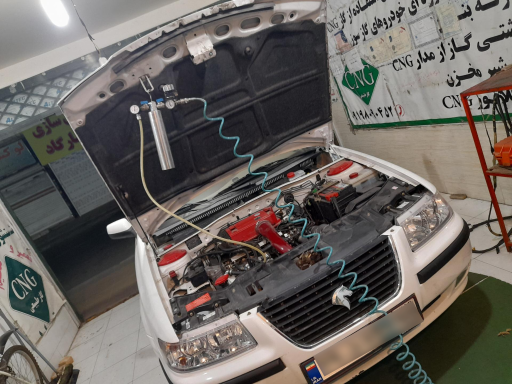 عکس تعمیر و تنظیم سی ان جی تسلط