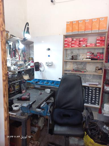 عکس تعمیر ابزار میرزا کریمی