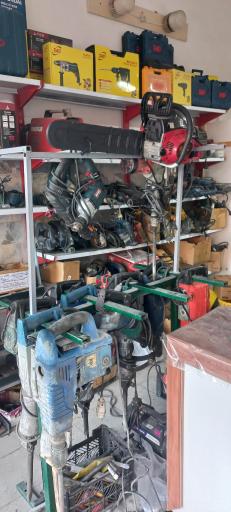 عکس تعمیر ابزار میرزا کریمی