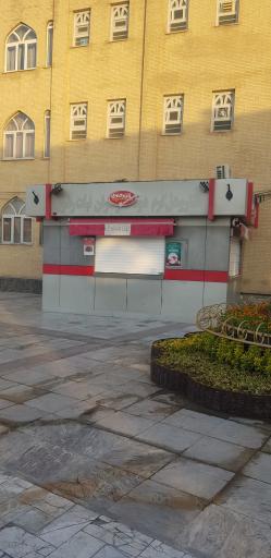 عکس کیوسک فروش  نان رضوی 