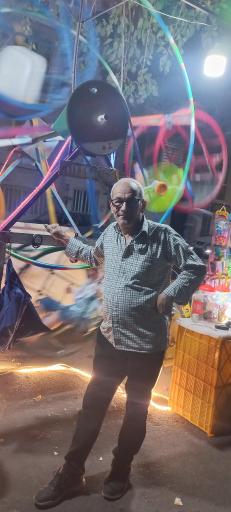 عکس چرخ و فلک عمو رضا 