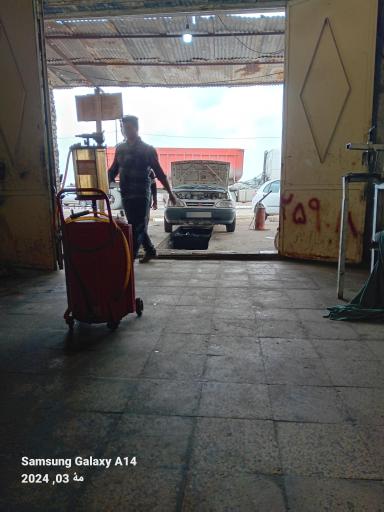 عکس تعویض روغن و پنچرگیری