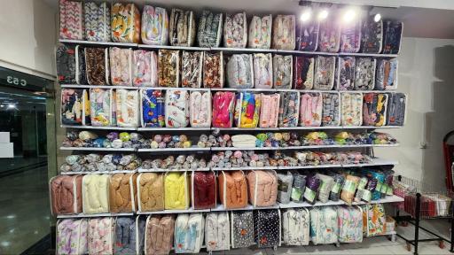 عکس فروشگاه مانیکاهوم