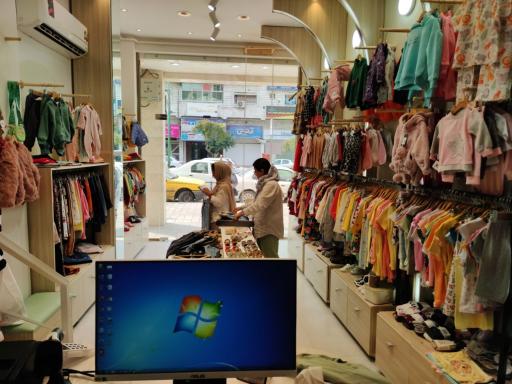 عکس فروشگاه لباس کودک تی تی گل