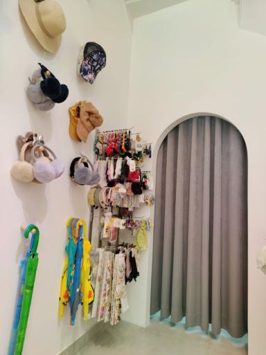 عکس فروشگاه لباس کودک تی تی گل