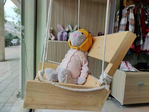 عکس فروشگاه لباس کودک تی تی گل