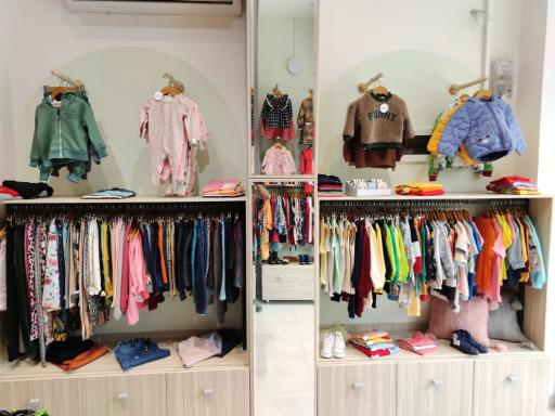 عکس فروشگاه لباس کودک تی تی گل