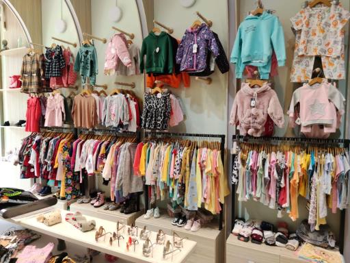 عکس فروشگاه لباس کودک تی تی گل