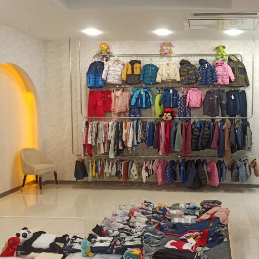 عکس فروشگاه لباس کودک لوپی