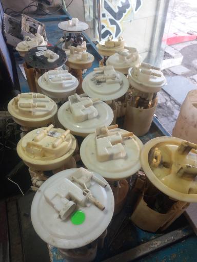 عکس تعمیرگاه و فروشگاه کیلومتر و آمپر قهرمانی