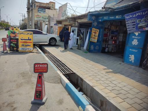 عکس تعویض روغن ملت 