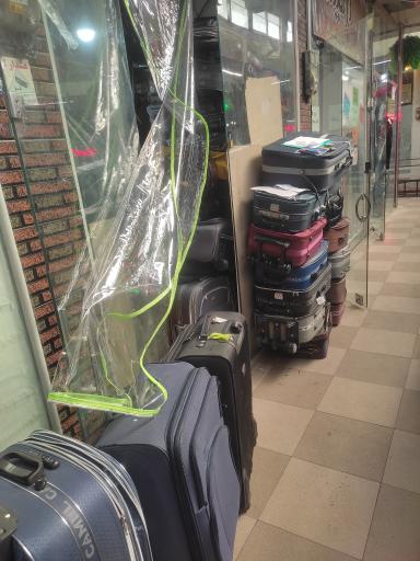 عکس تعمیر چمدان و کیف