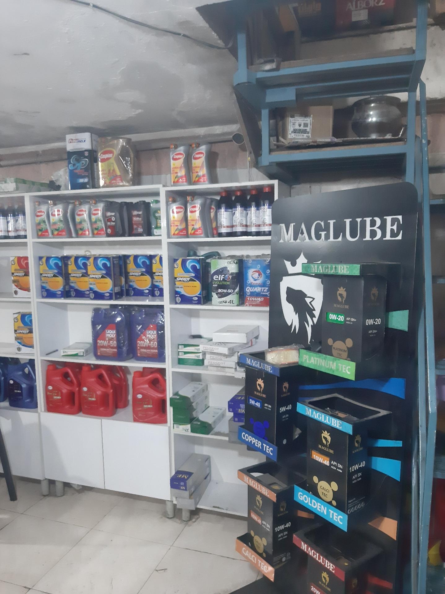 عکس اتوسرویس و تعویض روغن و لاستیک اندیشه