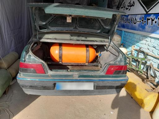 عکس تعمیرگاه تخصصی خودروهای دوگانه سوز 