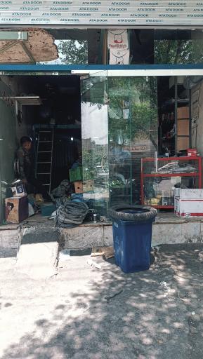 عکس تعمیرگاه موتورسیکلت المپیک حسن