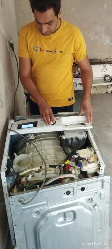عکس تعمیرات لوازم خانگی دهقان 