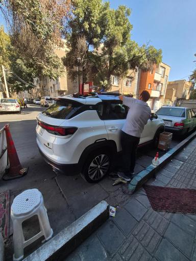 عکس شیشه دودی میلاد