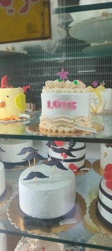 عکس شیرینی سرای همیشه سبز