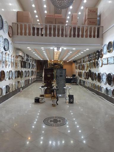 عکس تولید و پخش ساعت دیواری آونگ 