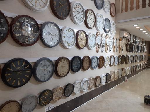 عکس تولید و پخش ساعت دیواری آونگ 