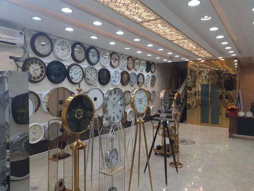 عکس تولید و پخش ساعت دیواری آونگ 