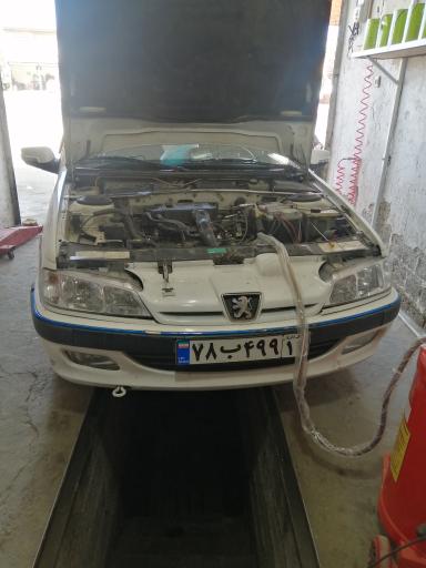 عکس تعویض روغن مسعود عبدالهی