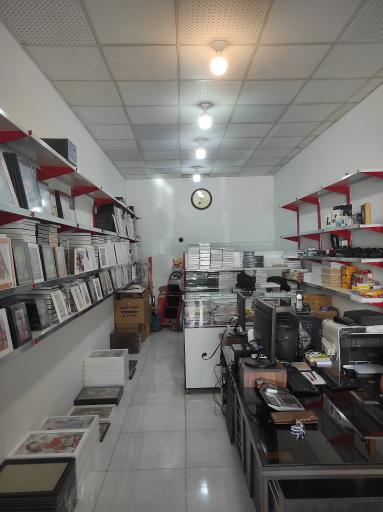 عکس فروشگاه لوازم عکاسی شات