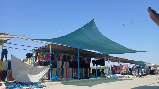 عکس مرکز خرید جمعه بازار دائمی شوش