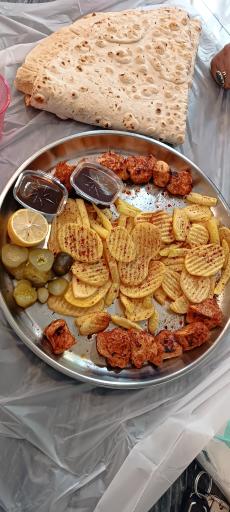 عکس مرغ ذغالی طاووق