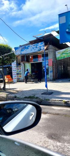 عکس نانوایی سنگک سنتی جنب مرغ ماهی فروشی عباس آباد