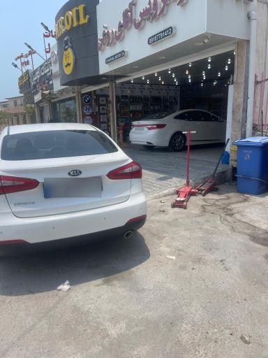 عکس اتوسرویس اقای روغن