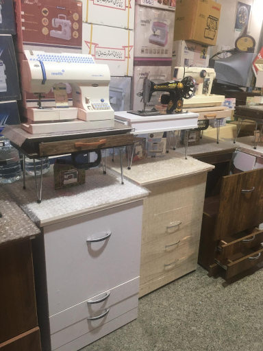 عکس فروشگاه چرخ خیاطی گنجینه