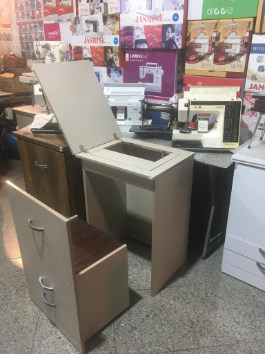 عکس فروشگاه چرخ خیاطی گنجینه