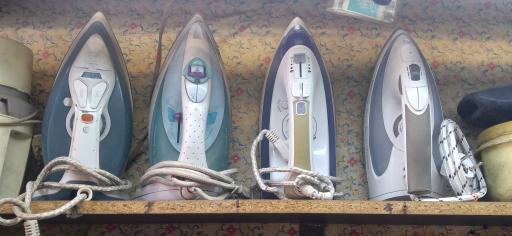 عکس تعمیرات لوازم خانگی منفرد