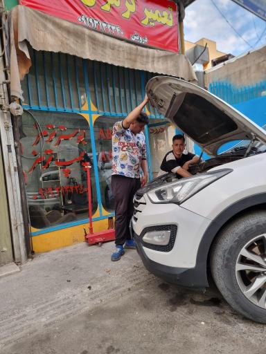 عکس تعمیر بوستر ترمز و بلوک ABS درویش