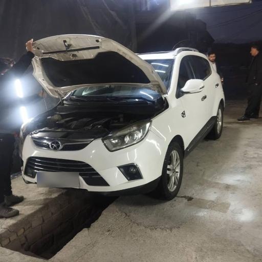 عکس کارشناسی وتشخیص رنگ خودروکرمی