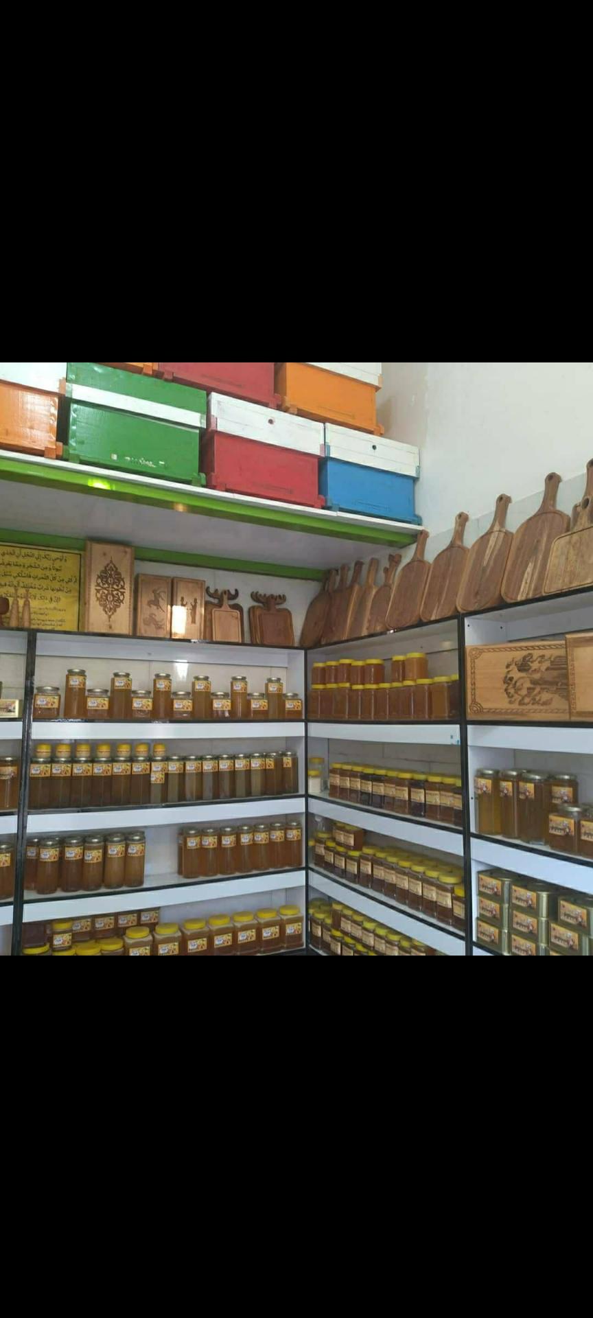 عکس فروشگاه عسل ملکه