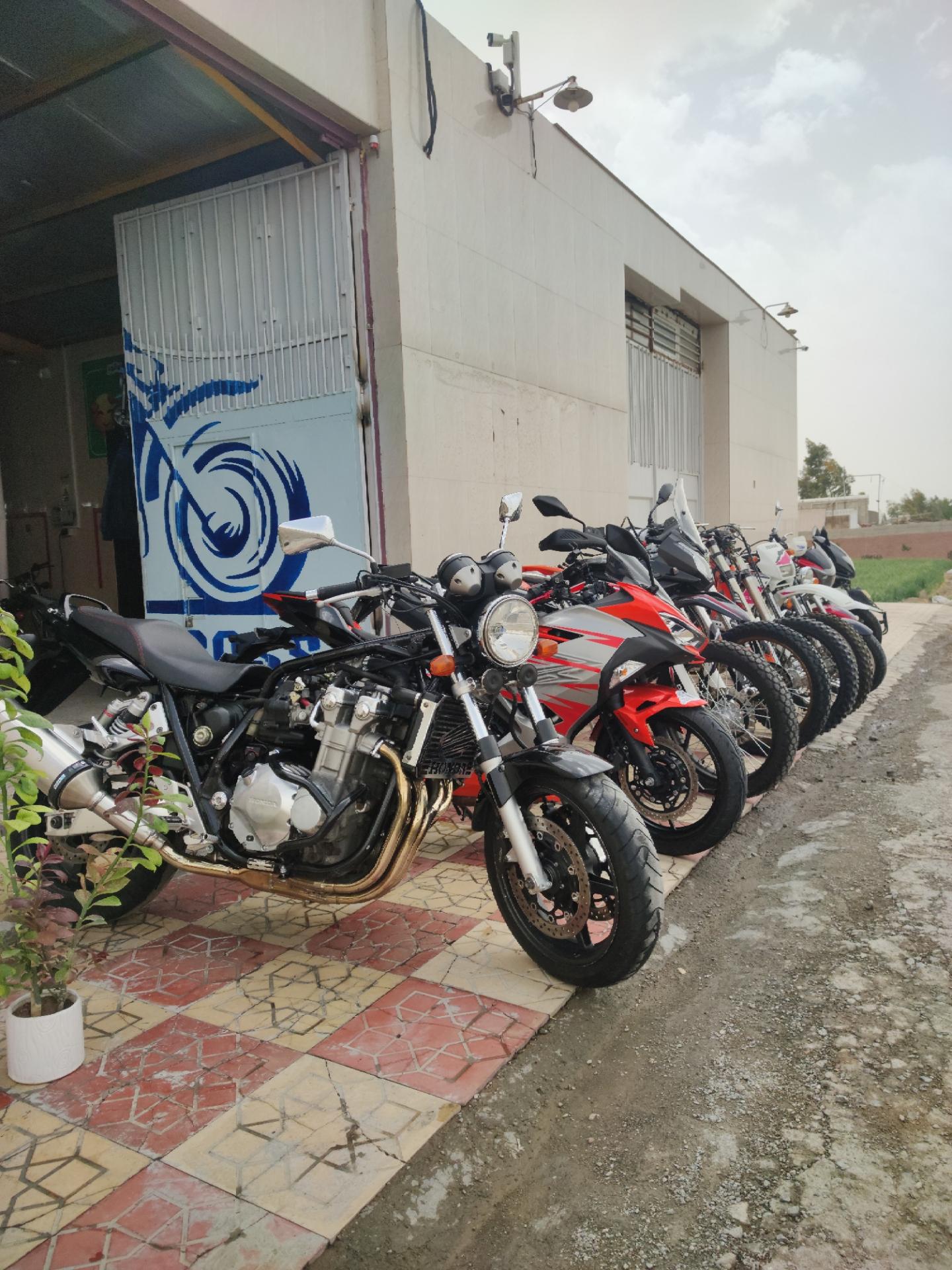 عکس گروه پژمان موتور
